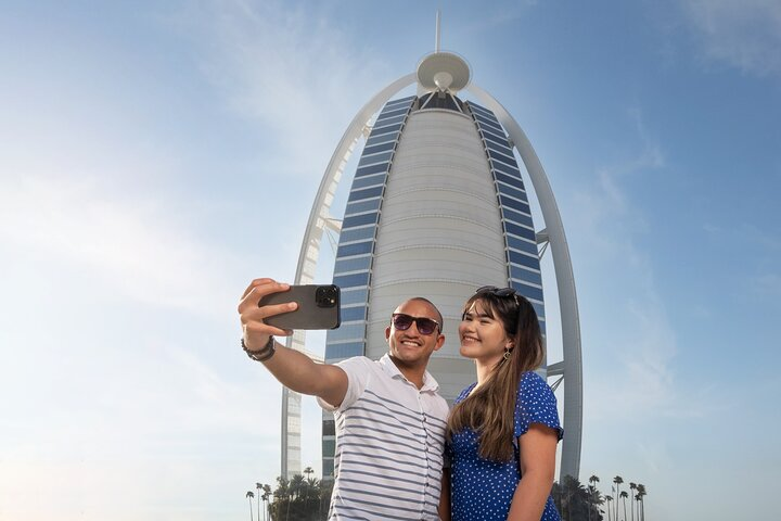 Capture unforgettable moments at the iconic Burj Al Arab surrounded by stunning architecture and breathtaking views of Dubai's skyline and the Arabian Gulf. An experience that speaks luxury and culture.